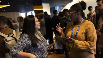 two women talking at Engage 2024
