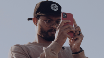 Man using a camera phone to take a picture